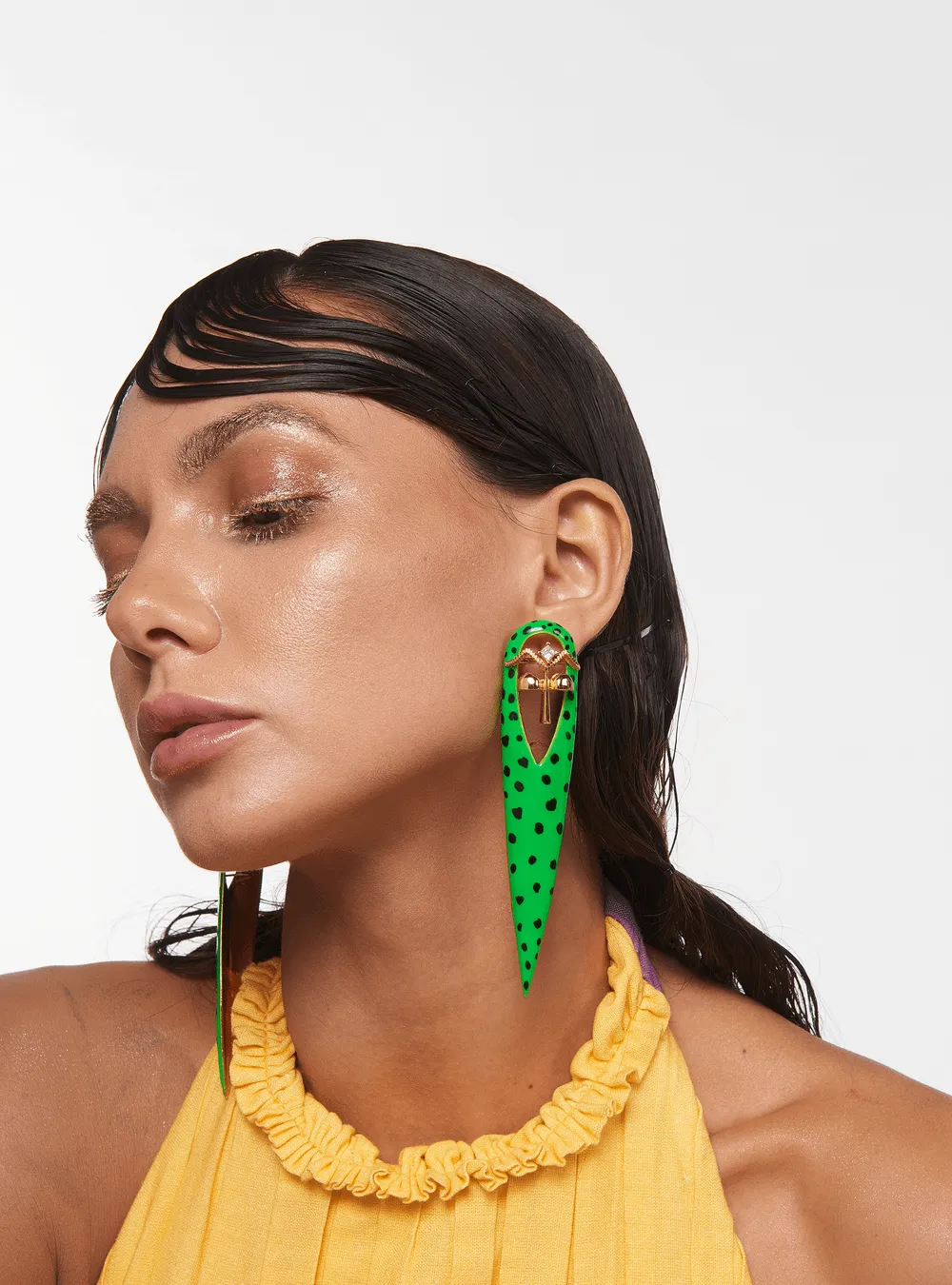 Halle Bailey Wearing Gavi Spicule Earrings In Green Leopard Enamel Finish