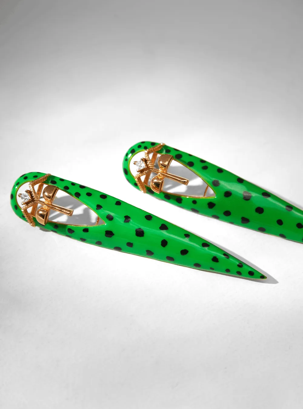 Halle Bailey Wearing Gavi Spicule Earrings In Green Leopard Enamel Finish