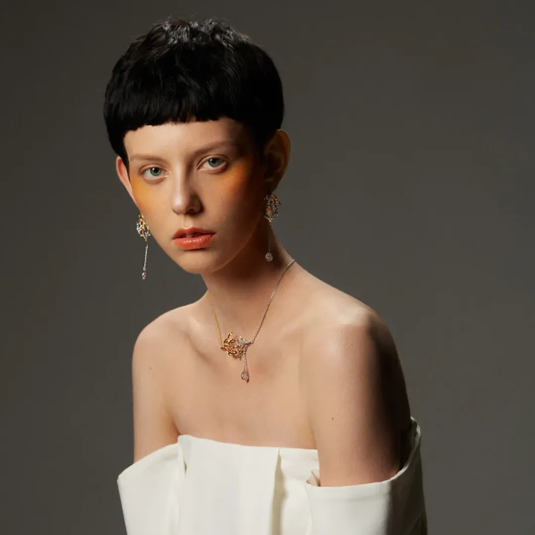 NM - Thorns · Flow Earrings METAL-Gold/White gold
