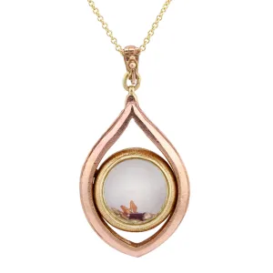 Spinning Monocle Pendant