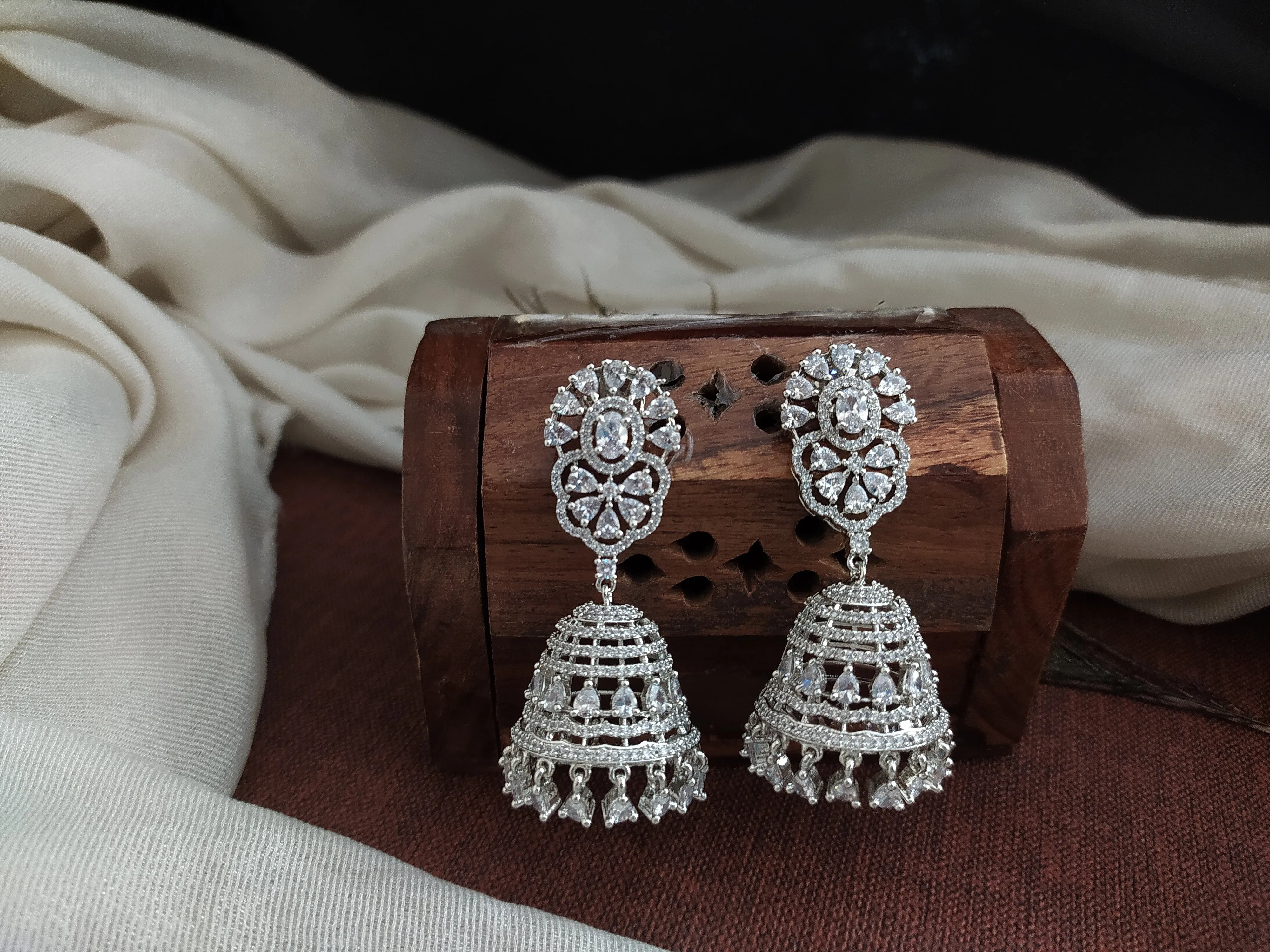Zircon Stone Diamond Oval Studded Jhumki Earrings