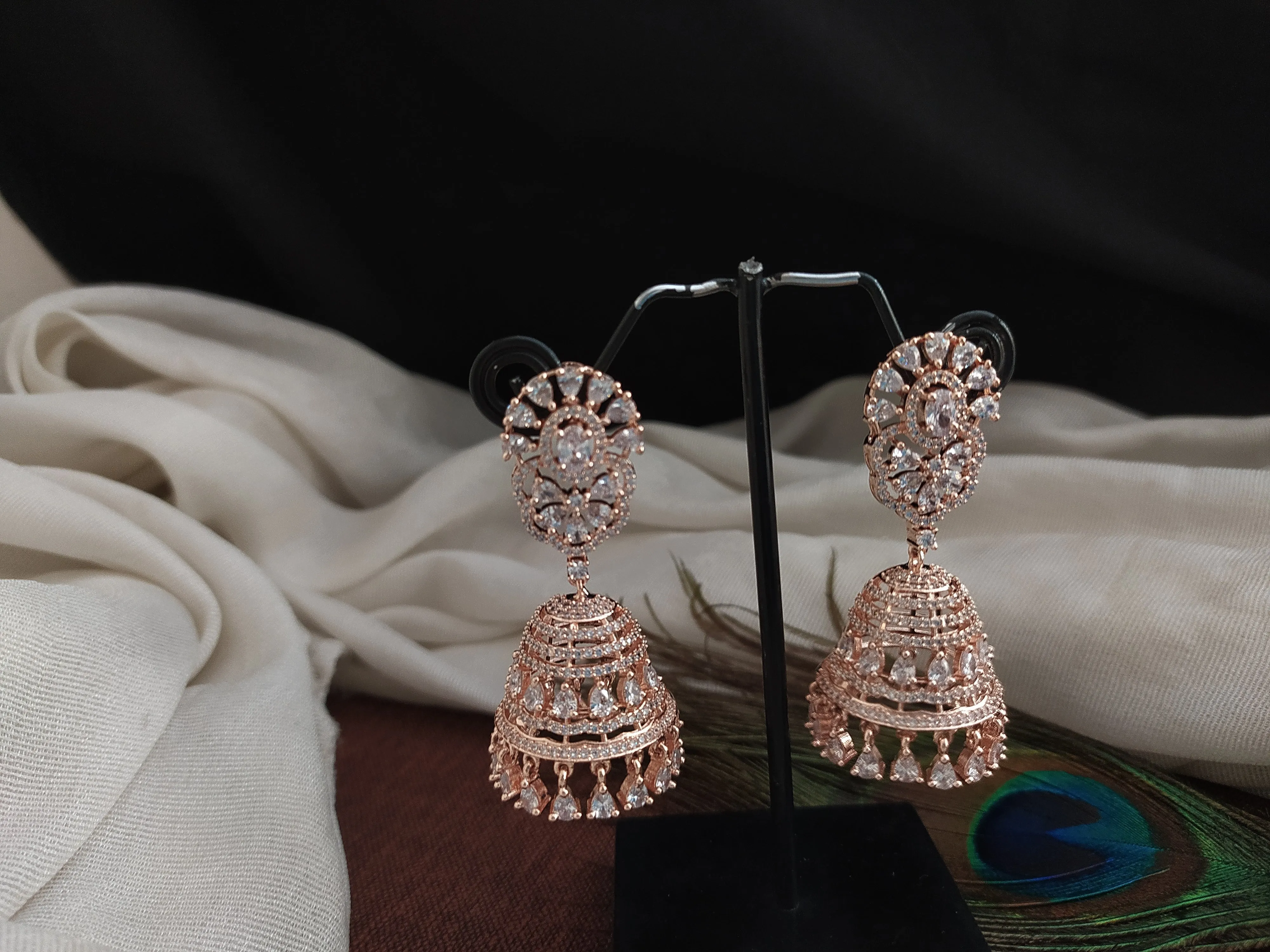 Zircon Stone Diamond Oval Studded Jhumki Earrings