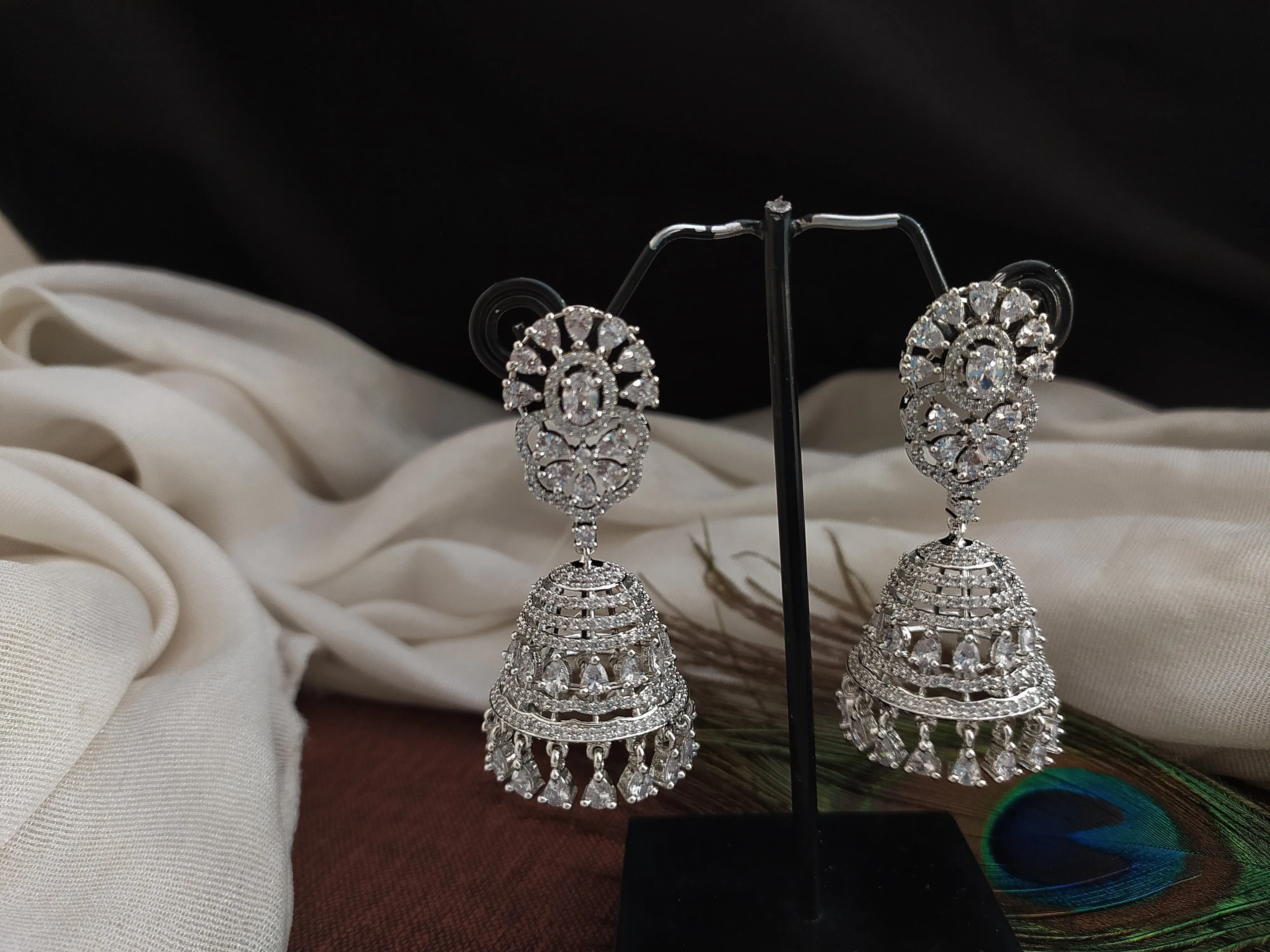 Zircon Stone Diamond Oval Studded Jhumki Earrings