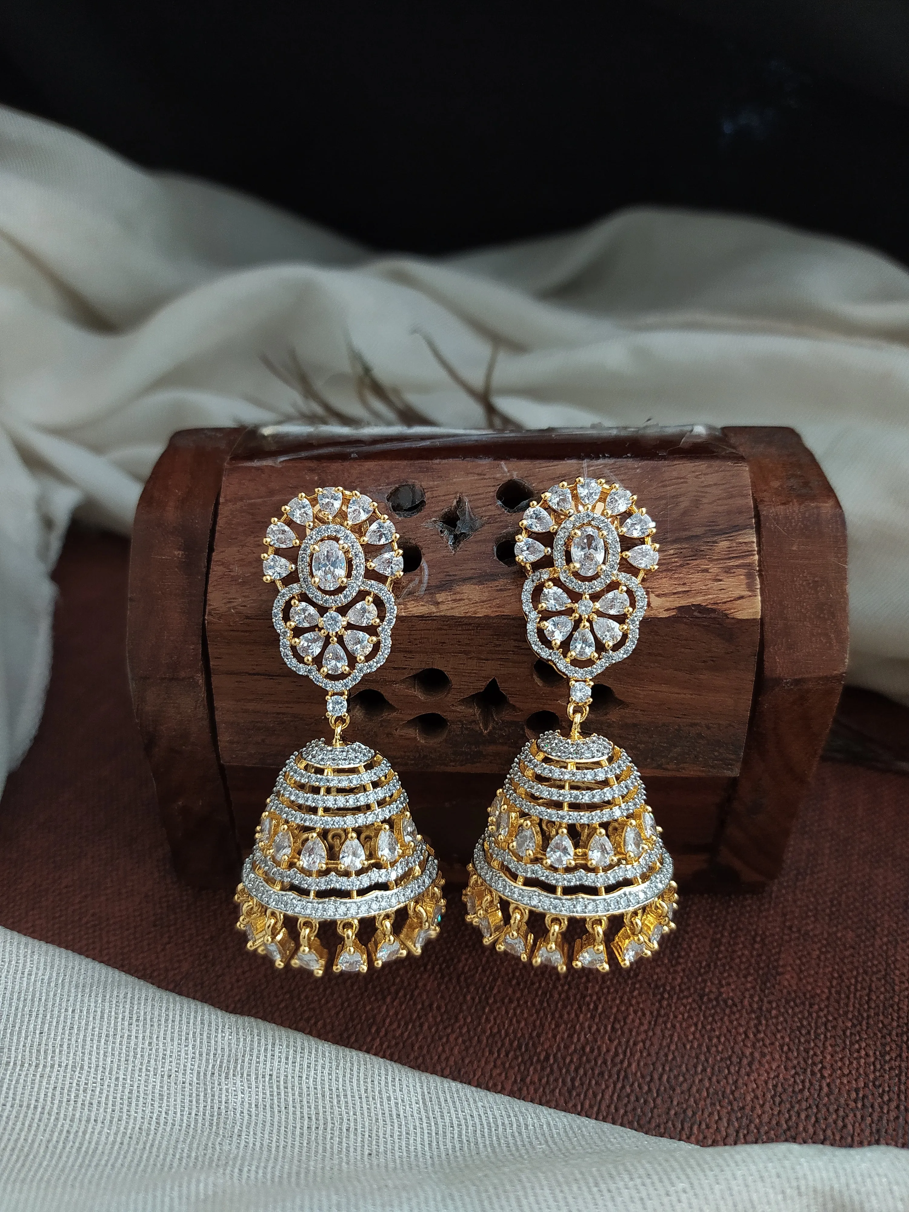 Zircon Stone Diamond Oval Studded Jhumki Earrings