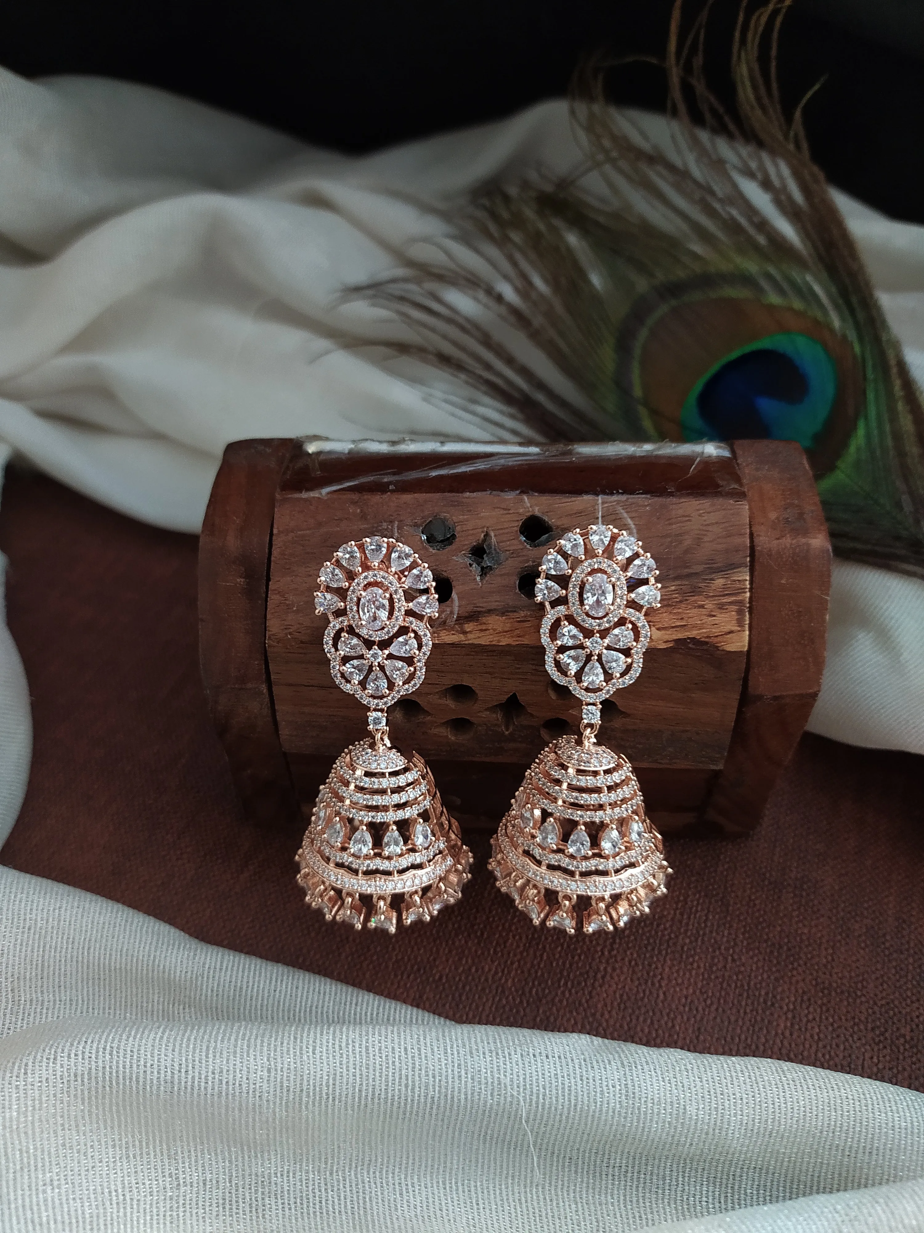 Zircon Stone Diamond Oval Studded Jhumki Earrings